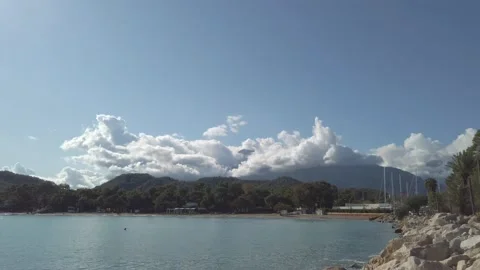 Timelapse of clouds above the mountains and sea Stock Footage 132513933