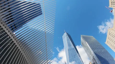 Timelapse of the clouds above Oculus and One World Trade Center (one of the h Video stock 325629829