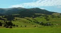 Timelapse of clouds and beautiful green fields HD Footage