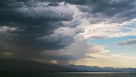 Timelapse of clouds and dust storm moving over Utah Lake Stock Footage 340838051