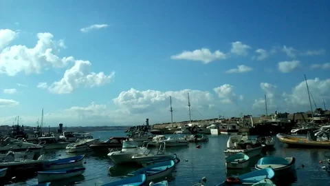 Timelapse  The clouds and Harbor Boats in  Algers Stock Footage 129528844