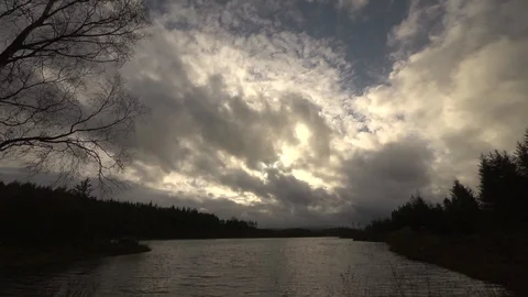 Timelapse of clouds and lake at the top of a mountain Stock Footage 86748227