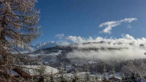 Timelapse of clouds and Mont Blanc - Winter time mountains Video stock 165682665