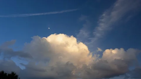 Timelapse of Clouds and Moon during Sunset Stock Footage 111296252