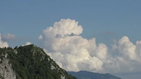 Timelapse of clouds and paragliders Stock Footage 159074862
