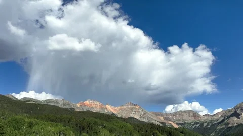 Timelapse of clouds and a rain shower over the San Juan Mountains in Colorado Stock Footage 279113527