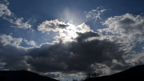 Timelapse of clouds and sun Stock Footage 115079971