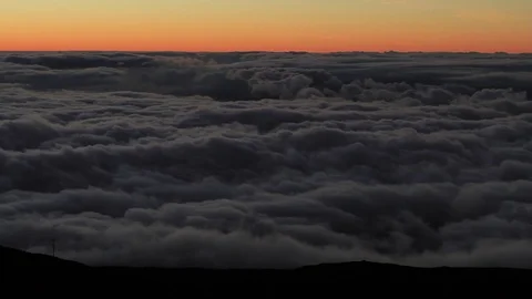 Timelapse of clouds and sun setting on Maui on top of Haleakala Volcano Stock Footage 78459898