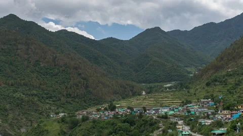 TimeLapse of Clouds and Sunlight Over Mountain Village of Uttarakhand in Daytime Stock Footage 263349624
