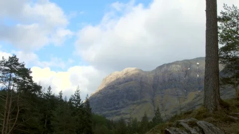 Timelapse of Clouds and Sunlight Playing across a Scottish Highland Mountain Stock Footage 85945798