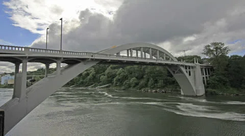 Timelapse of Clouds and Water with Oregon City Bridge over Willamette River Stock-Footage 24220954