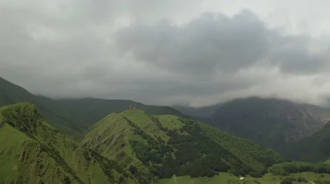 Timelapse. Clouds are running through the mountains. Stock Footage 66063054