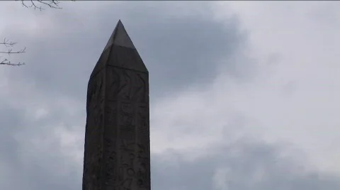 Timelapse of clouds behind Egyptian obelisk in Central Park Stock Footage 455260