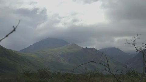 Timelapse Clouds Blowing in Over Mountains in Denali Stock Footage 121478377