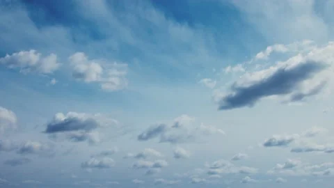 Timelapse of clouds on blue sky Stock Footage 130865794