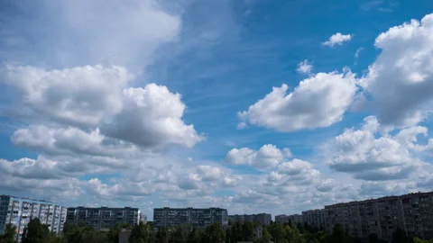 Timelapse of Clouds in the Blue Sky Moves Over the City Stock Footage 252014166