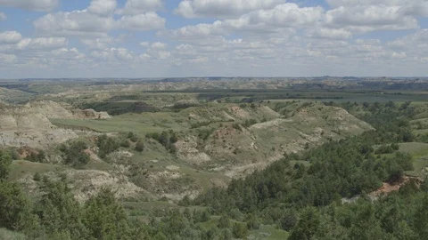 Timelapse Clouds Casting Shadows Over Badlands Landscape Stock Footage 121639520