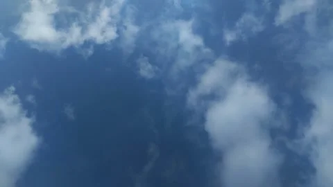Timelapse of clouds with a clear blue sky during the day. natural background 動画素材 295841261
