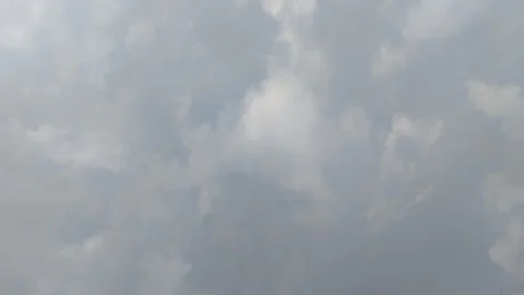 Timelapse of clouds with clear sky at noon in summer. texture effect 動画素材 293125075