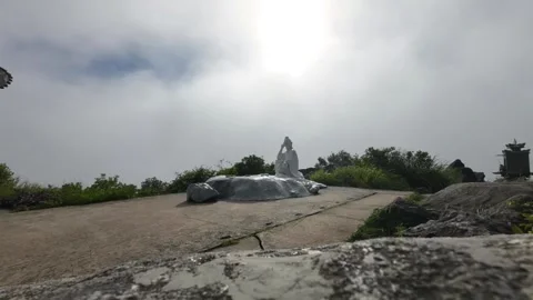 Timelapse of Clouds Clearing Above Ban Co Peak Chessboard Statue in Da Nang and Stock Footage 325843899
