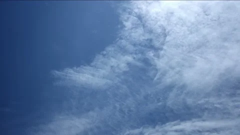 Timelapse of clouds clearing up on a Blue Sky Stock Footage 230281689