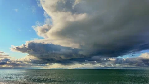 Timelapse Clouds Drifting Over Calm Blue Sea Stock-Footage 342336047