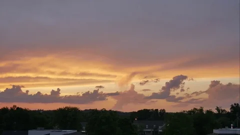 Timelapse of clouds during sunset in 4K Stock Footage 75846125