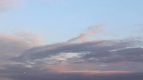 Timelapse of clouds during sunset with moon rising Stock Footage 144285115