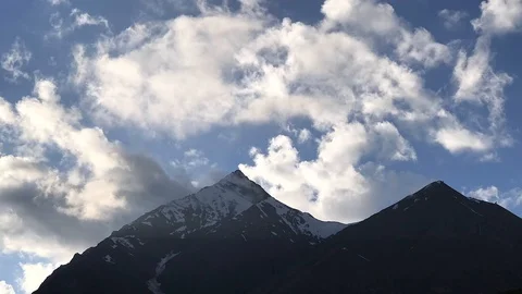 Timelapse clouds float across over mountains at sunset, Georgia, Caucasus. Video stock 115530706