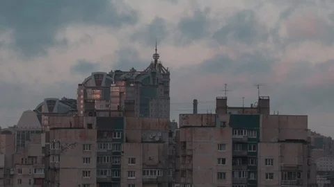 Timelapse. clouds float on the background of old high-rise buildings Stock Footage 123372916