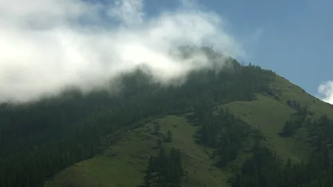 Timelapse clouds flow over Mongolian mountain slope - Calm Mood and Cloudscape Stock Footage 339716722