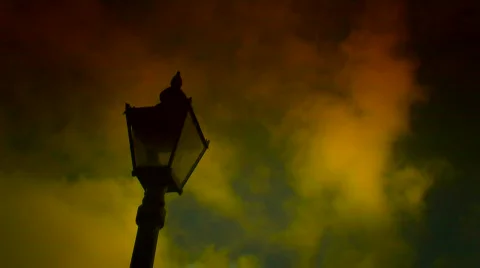 Timelapse clouds flow past a victorian lamppost  Stock Footage