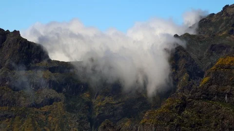 Timelapse of clouds flowing in the mountains Stock Footage 126351449