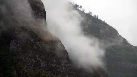 Timelapse of clouds flowing in the mountains Stock Footage 126398909