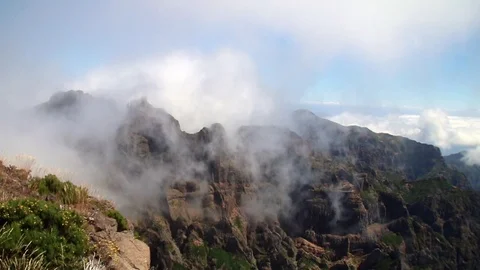 Timelapse of clouds flowing in the mountains Stock Footage 126503153