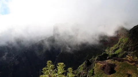 Timelapse of clouds flowing in the mountains Stock Footage 126503358