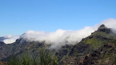 Timelapse of clouds flowing in the mountains Stock Footage 126503473