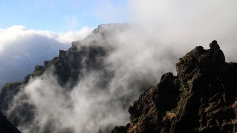 Timelapse of clouds flowing in the mountains Stock Footage 126504520