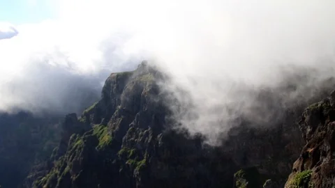 Timelapse of clouds flowing in the mountains Stock Footage 126504527