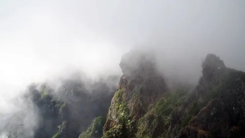 Timelapse of clouds flowing in the mountains Stock Footage 126504962