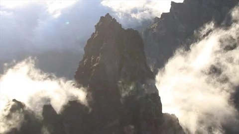 Timelapse of clouds flowing in the mountains Stock Footage 126507606