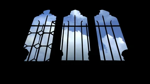 Timelapse clouds flowing past arched church windows Stock Footage 937621