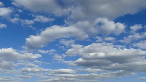 Timelapse with clouds fly away and a clear blue sky appears Stock Footage 97603909
