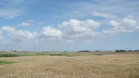 Timelapse clouds fly over field Stock Footage 65824075