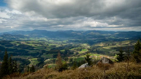 Timelapse clouds fly over a valley in the mountain Stock Footage 134545811