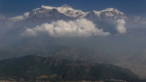 Timelapse of clouds form below the top of Annapurna South Stock Footage 59066993