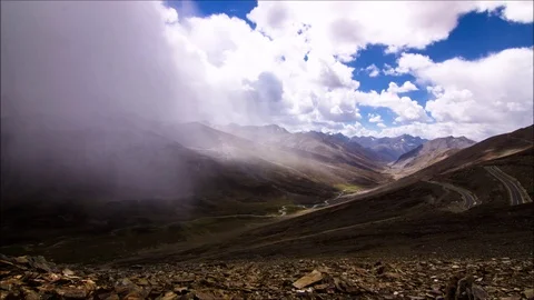Timelapse of clouds forming and snowing on mountains Stock Footage 96717020