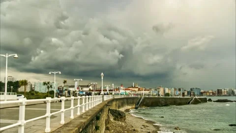 Timelapse of the clouds on Gijon's seafront promenade Stock Footage 153407960