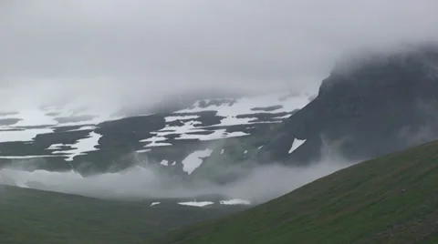 Timelapse clouds in a glacial valley with snow patches Stock Footage 37269166