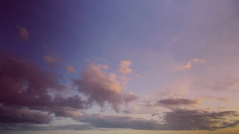 Timelapse with clouds gradually filling the sky from left to right at dawn. Stock Footage 87314214